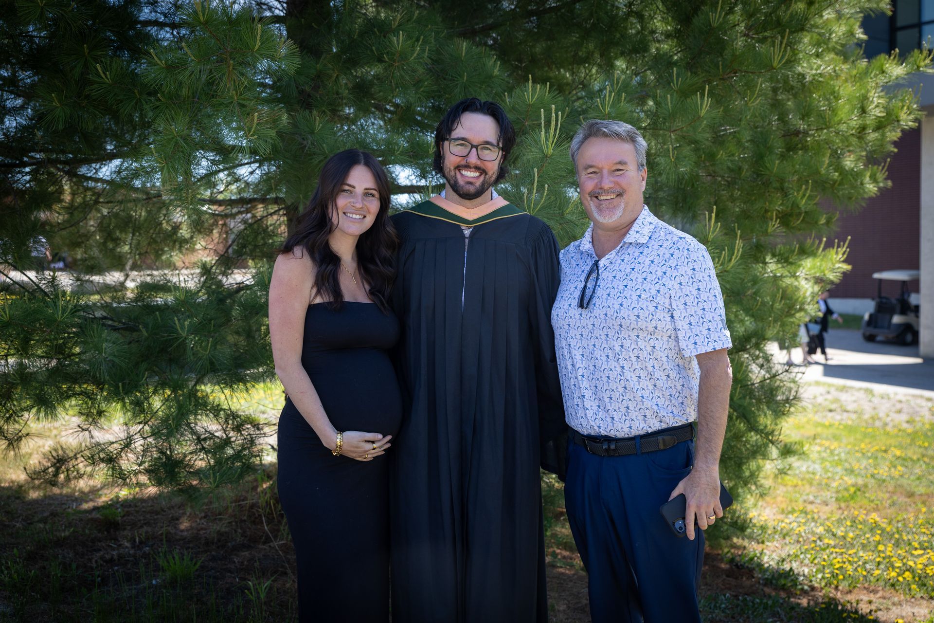 Nipissing University graduate with their family