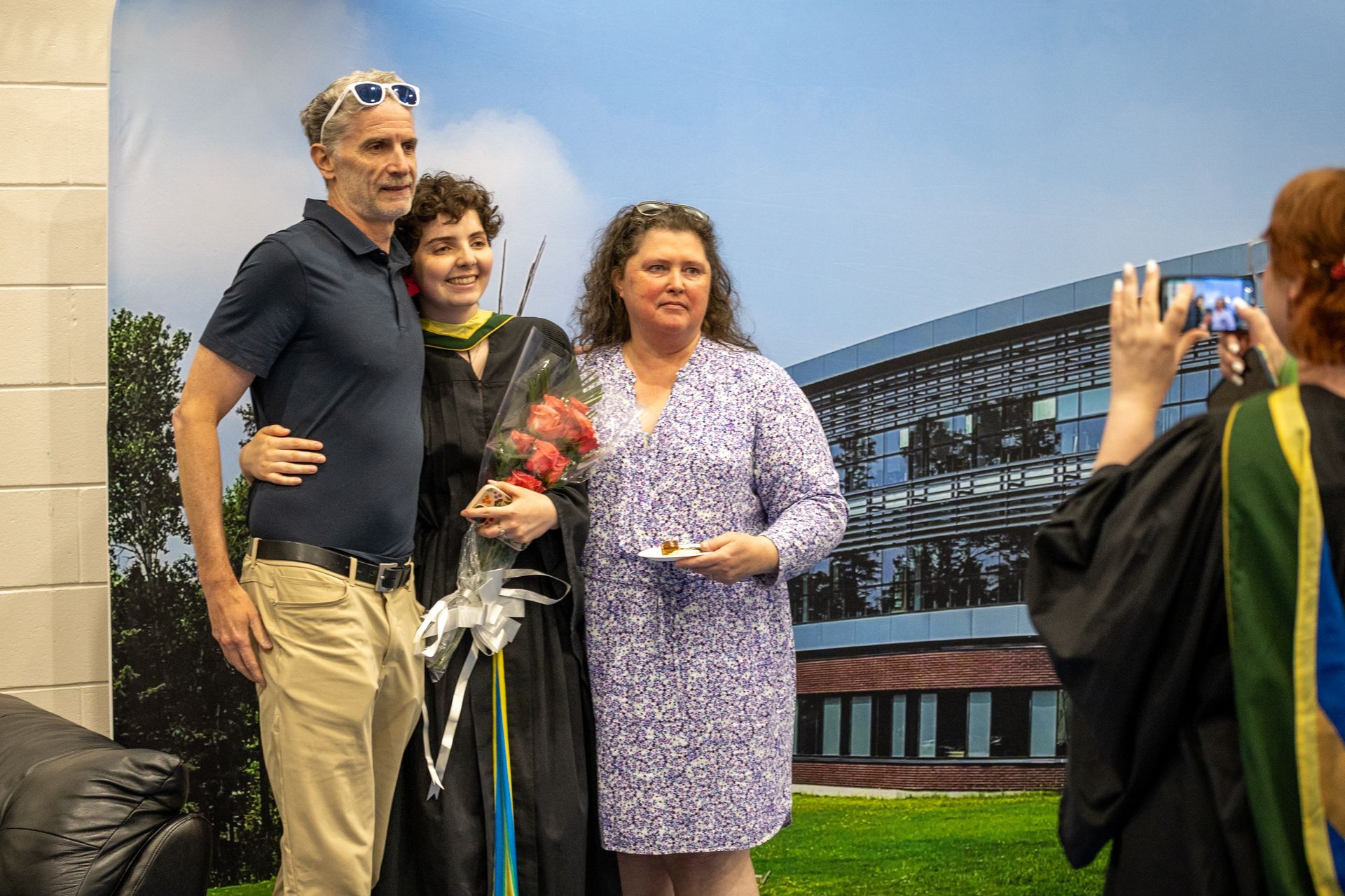 Nipissing University graduate with their family