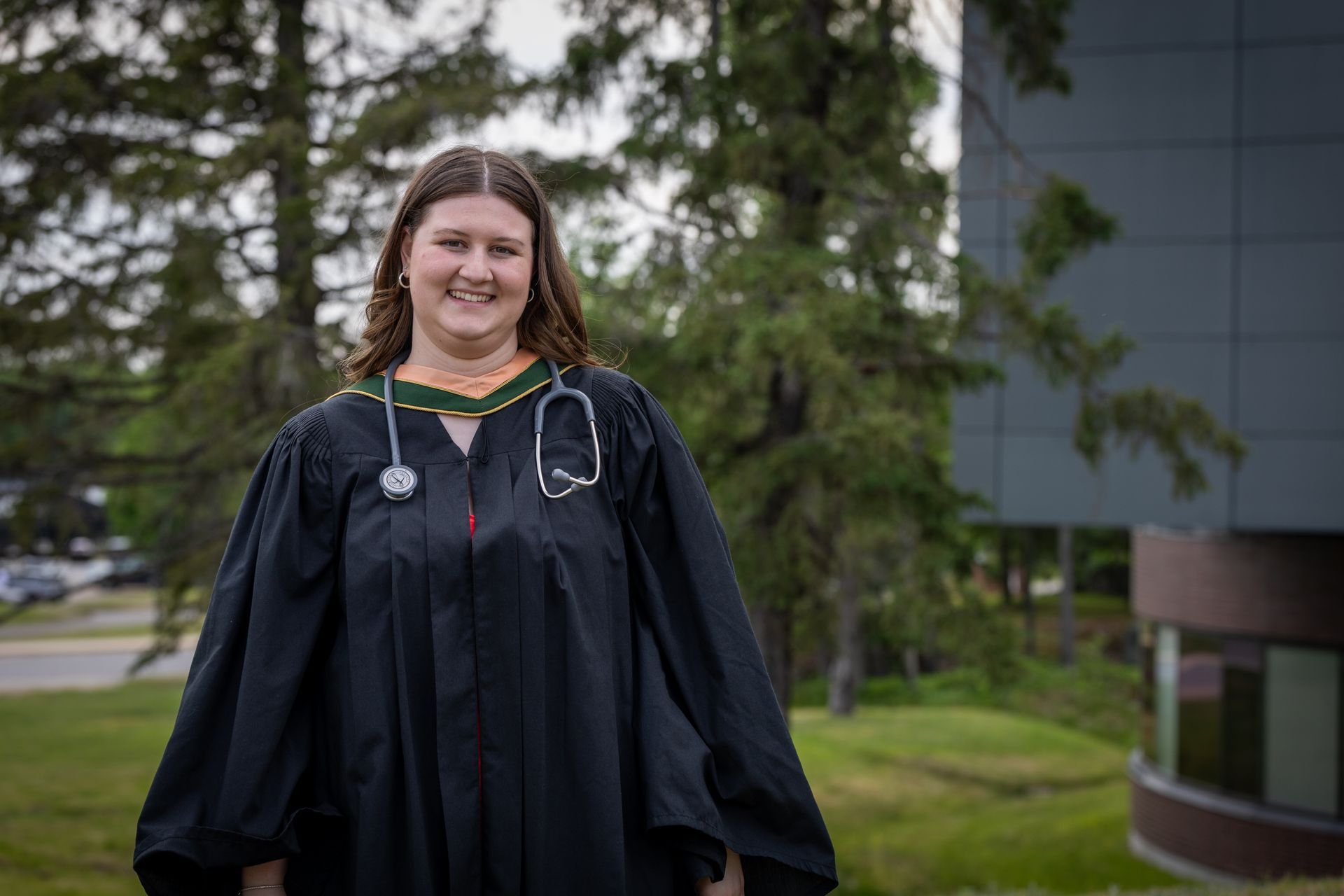 Nipissing University graduate posing for a picture 