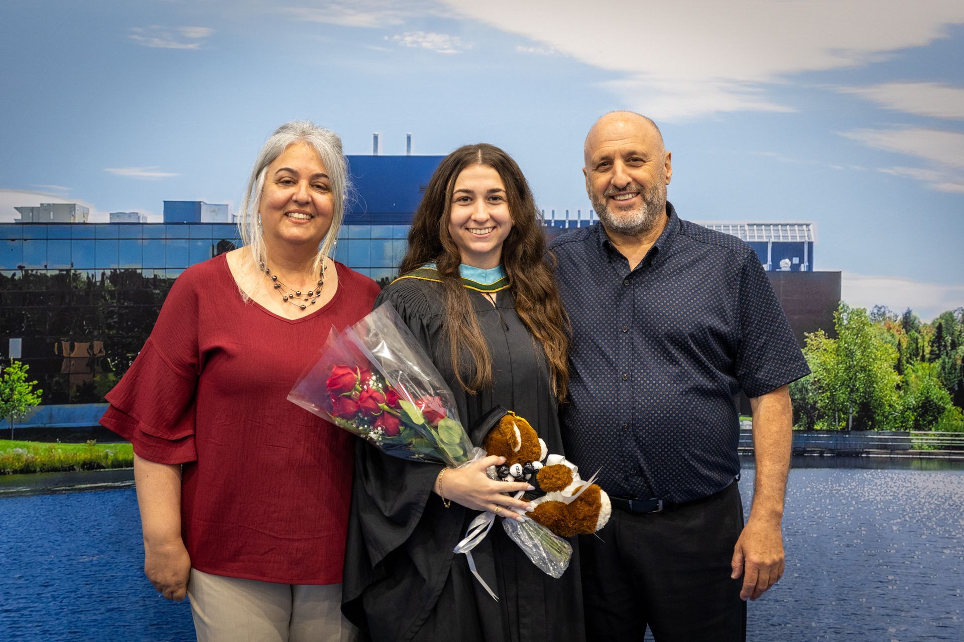 Nipissing University graduate with their family