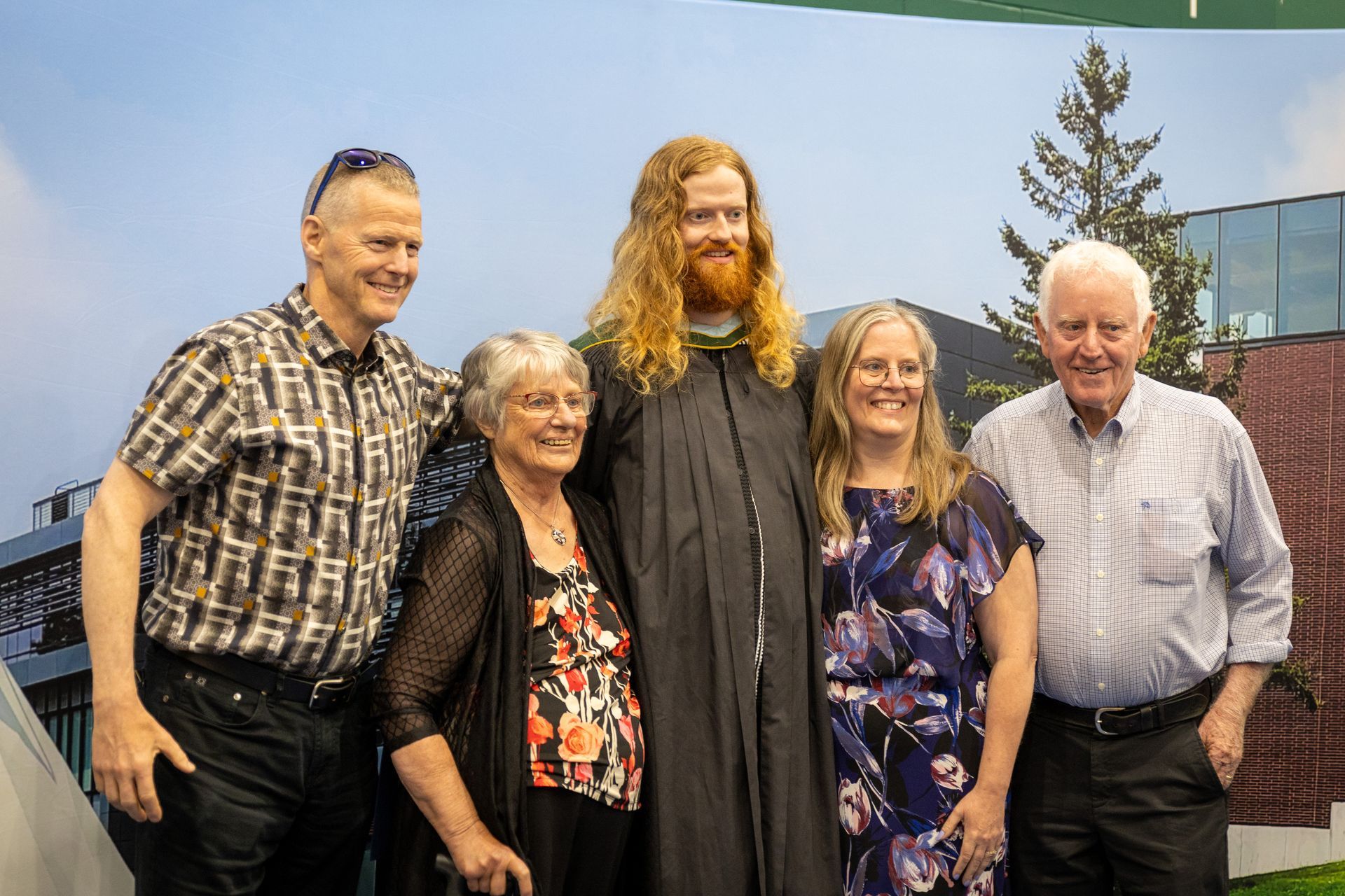 Nipissing University graduate with their family