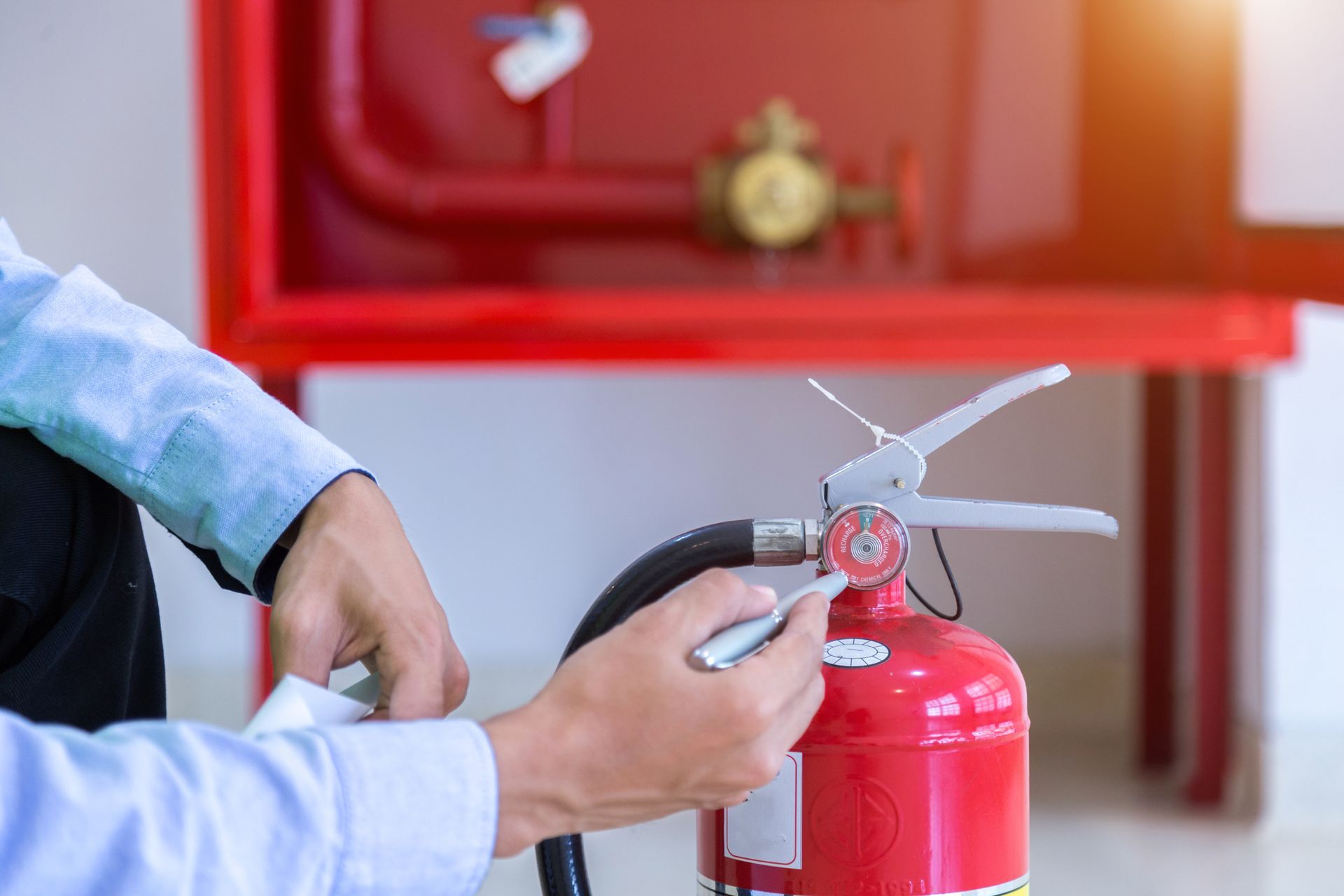 Fire extinguisher inspection at Amerisafe Inc. in Tumwater, WA - ensuring fire extinguisher recharge and safety services.