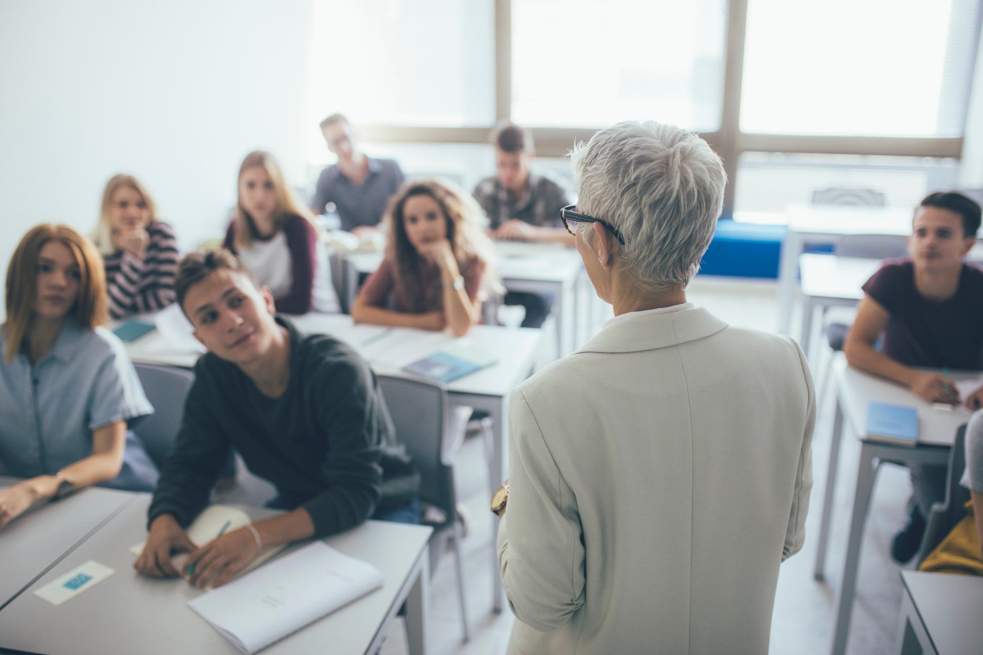 Instructor teaching college students