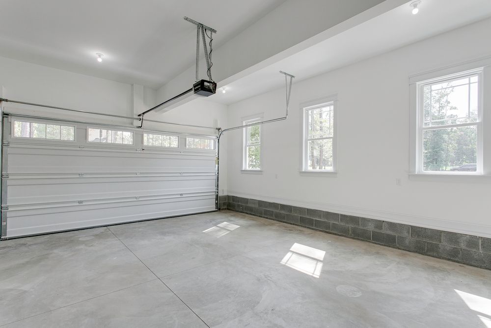 The inside of a newly built garage - For garage additions in Green Bay, WI, rely on Alley Remodeling. 
