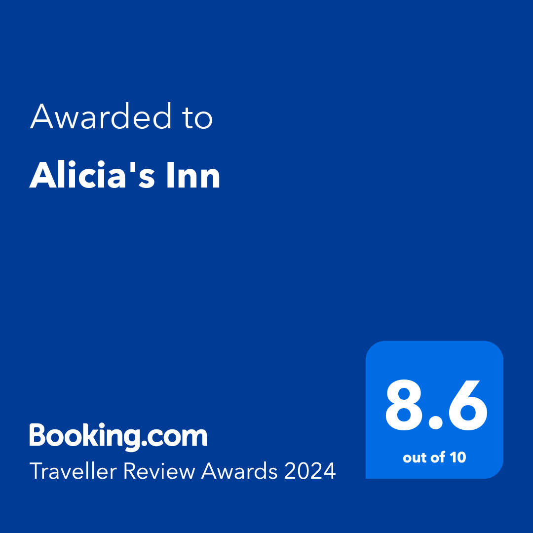 Booking.com Traveller Review Awards 2024 badge for Alicia's Inn, showing 8.6 out of 10 on blue background