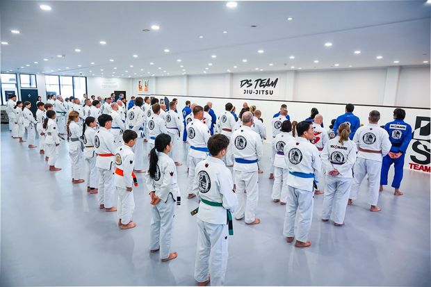 Student receiving belt promotion