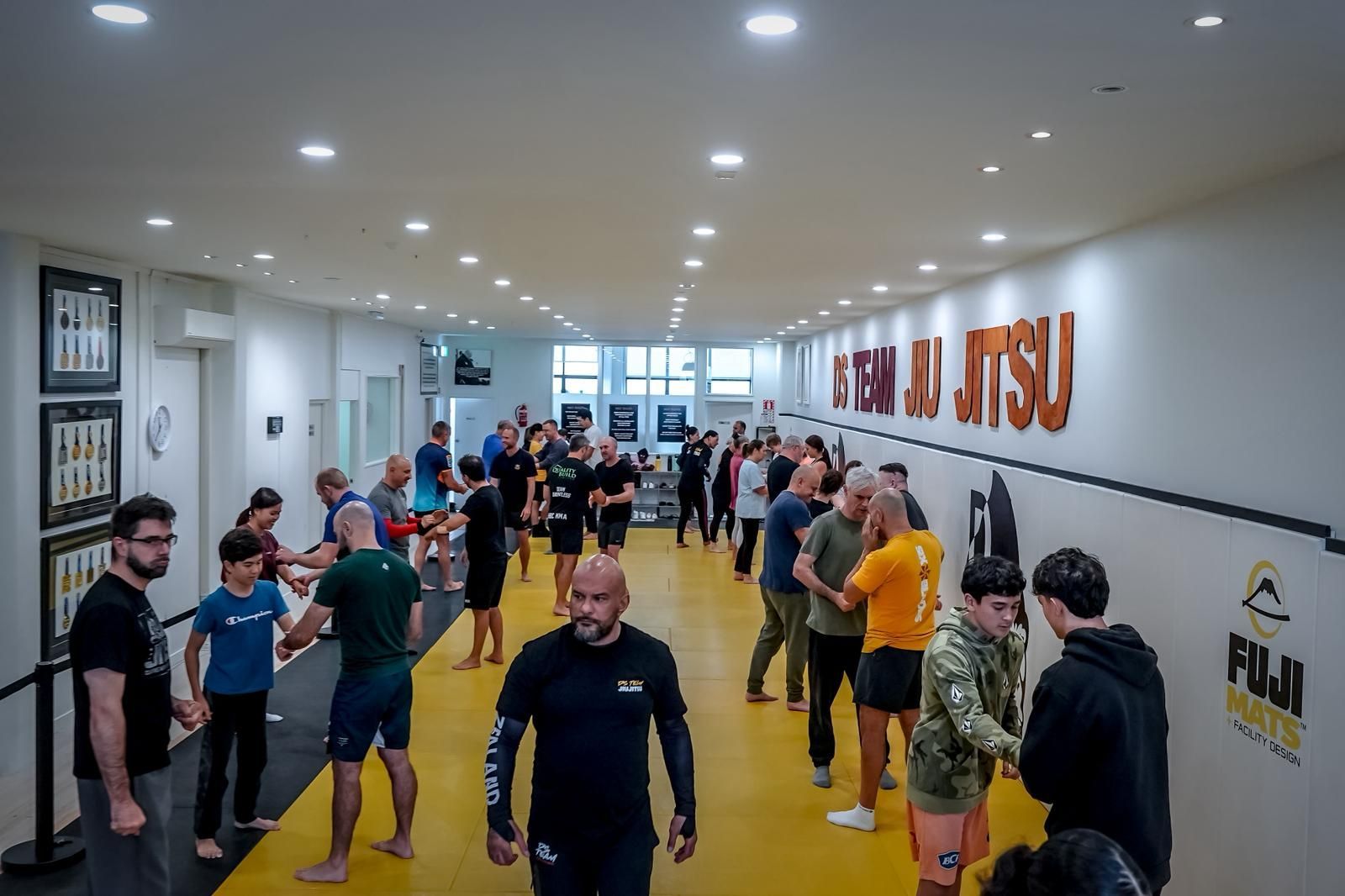 Adults sparring in Brazilian Jiu-Jitsu class