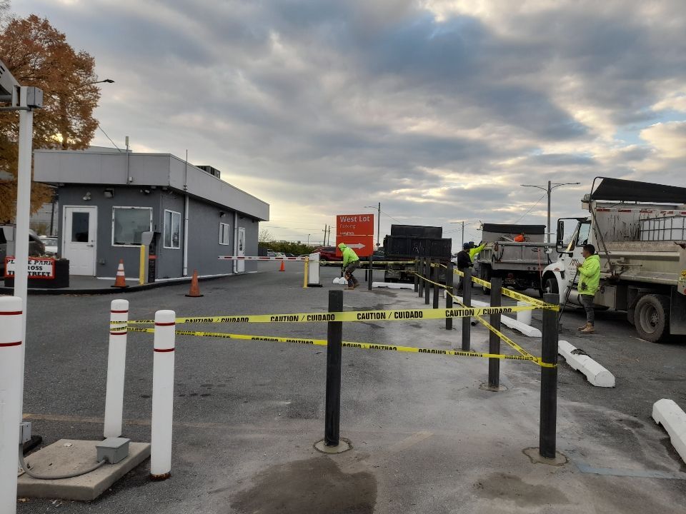 a truck is parked in a parking lot next to a building