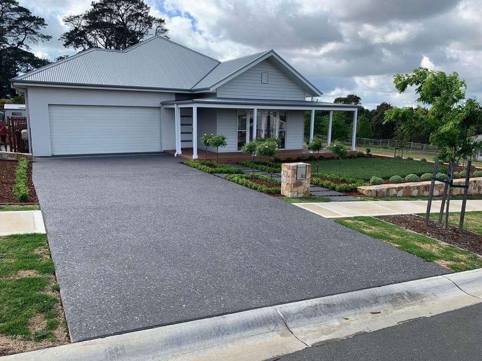 Driveway With Landscaped Lawn - Concreting in Southern Highlands, NSW