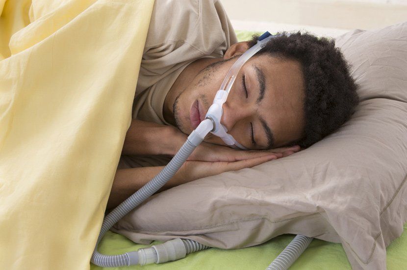 Man with Sleep Apnea Using a CPAP Machine — Sleep Apnoea in Newcastle, NSW