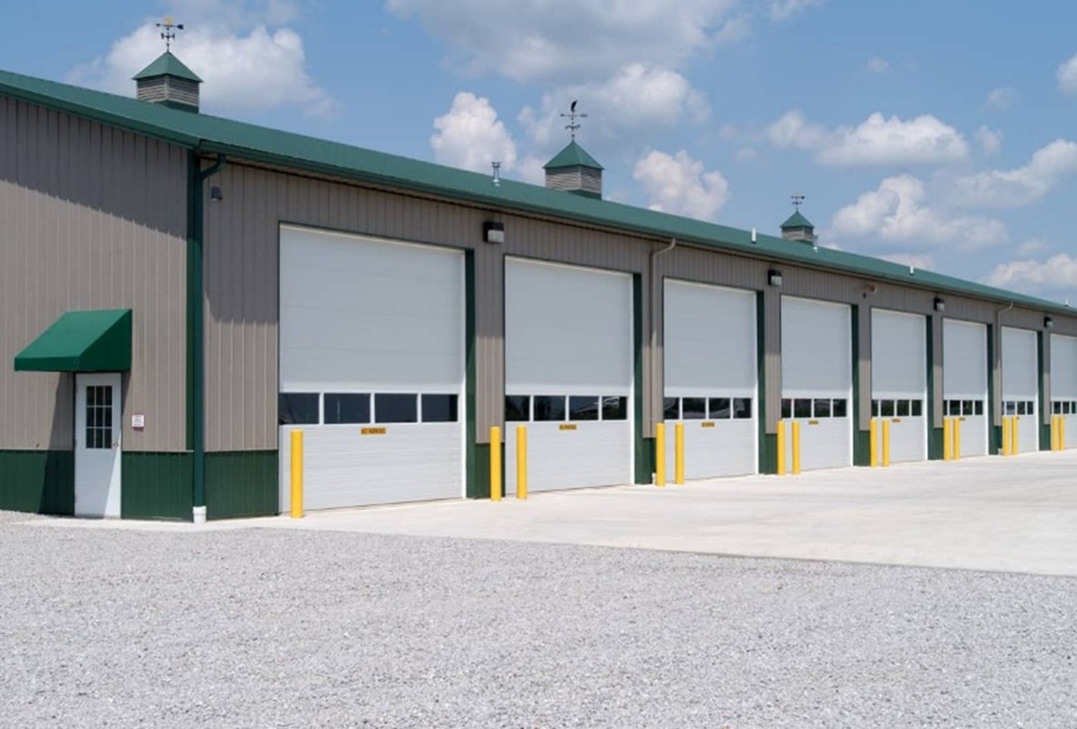 A building with a lot of garage doors on it