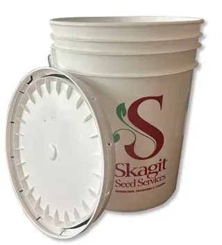 White plastic bucket with lid, printed Skagit Seed Services logo