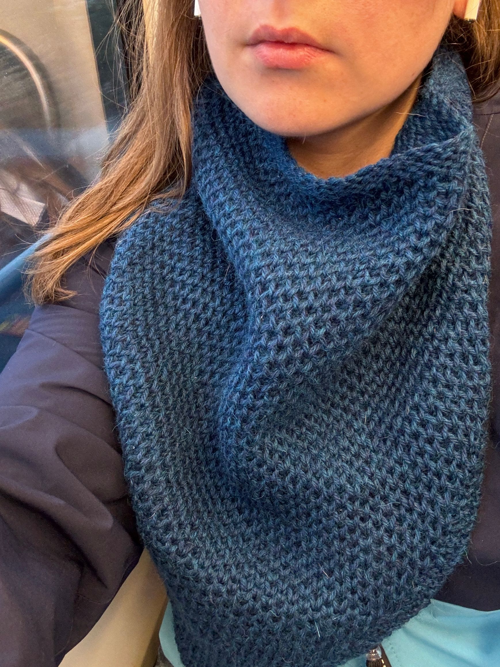 woman wearing knitted cowl