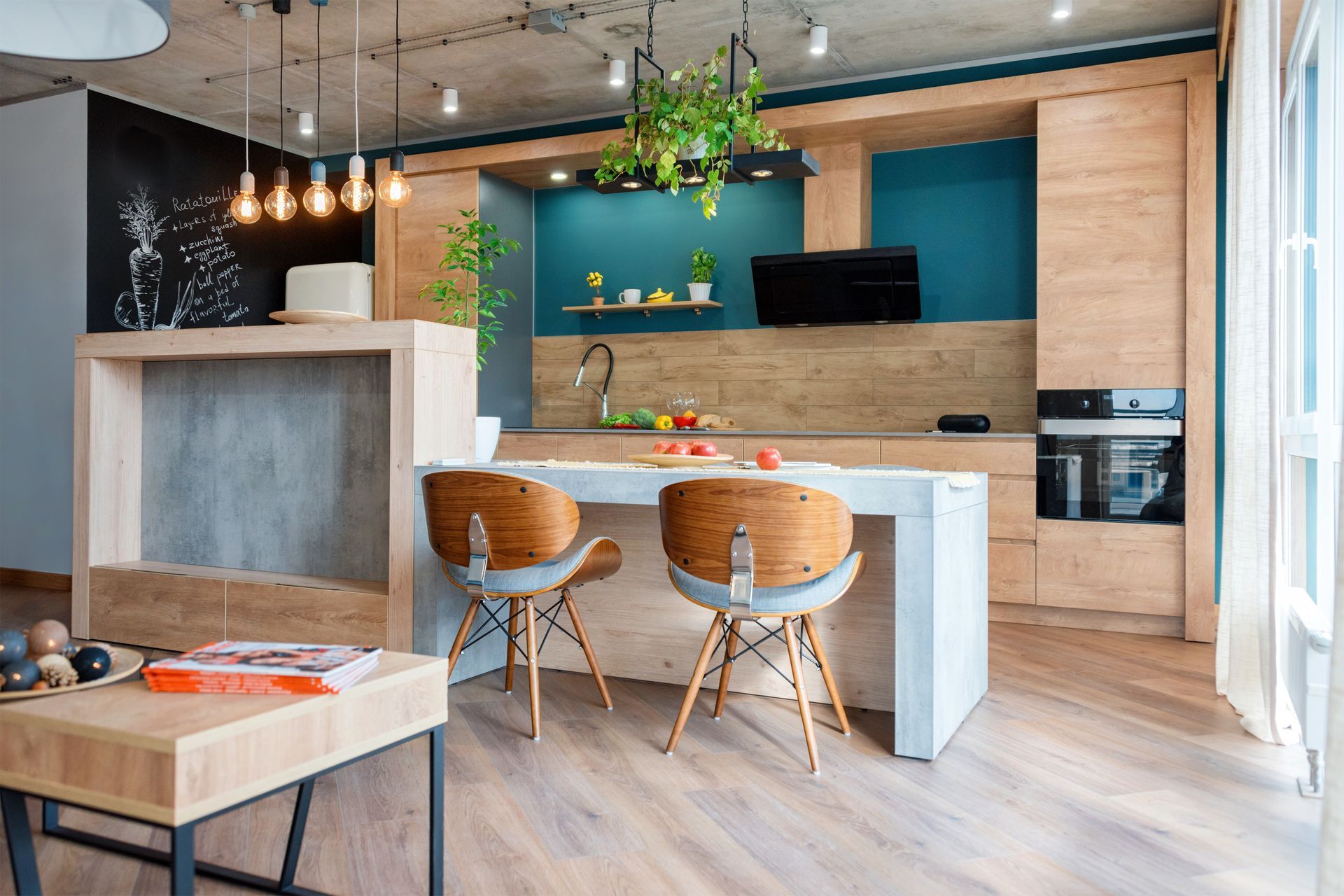 Modern kitchen with wood accents, teal backsplash, island seating, and hanging pendant lights
