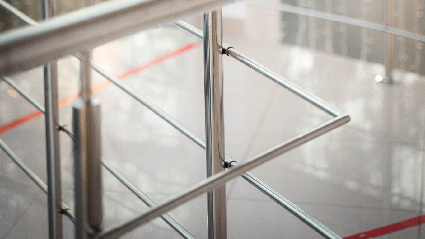 Glass staircase with metal railings installed in Chicago