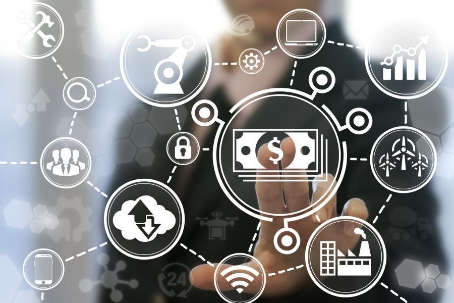 Person touching a network of interconnected icons, including money, data, and industry symbols.