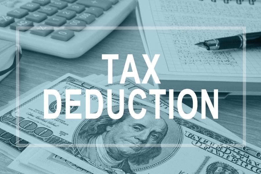 Money, calculator, and notepad with