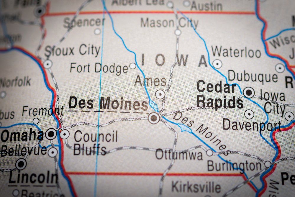 Map of Iowa, USA, showing cities like Des Moines, Cedar Rapids, and Omaha.