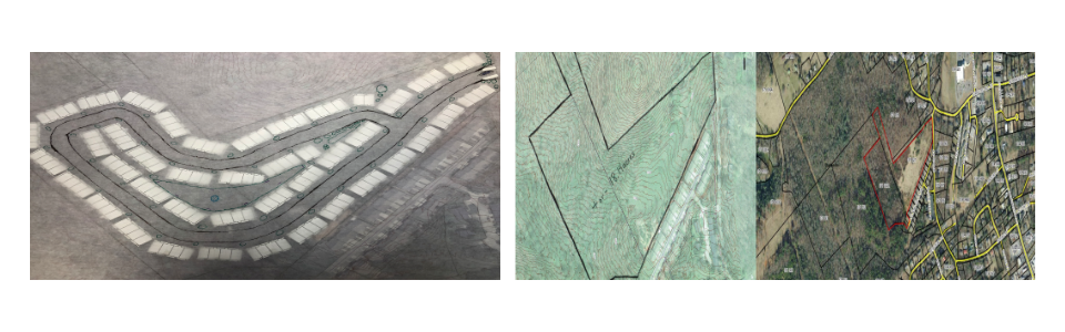 Aerial view of a curved white and gray roof beside a green field and mixed urban area.
