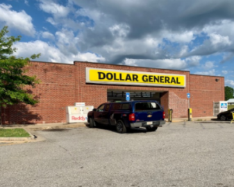 Dollar General storefront with a blue SUV parked outside under a cloudy sky.