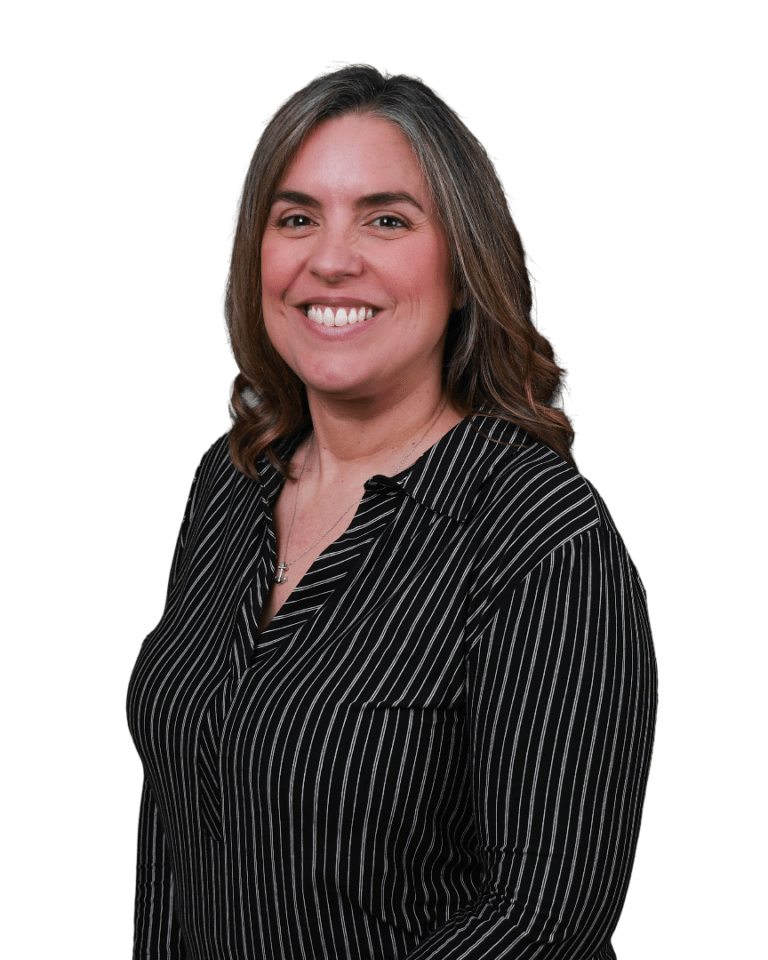 Smiling woman in a black striped shirt against a white background