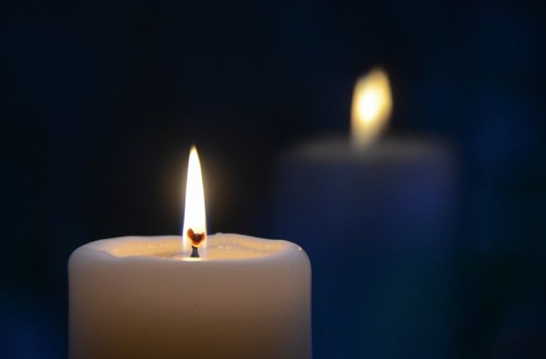 Memorial candles symbolize remembrance during cremation services in Burbank, IL.