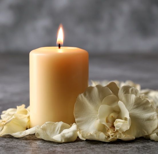 Memorial candle with flowers at funeral homes in Burbank, IL, honoring remembrance.