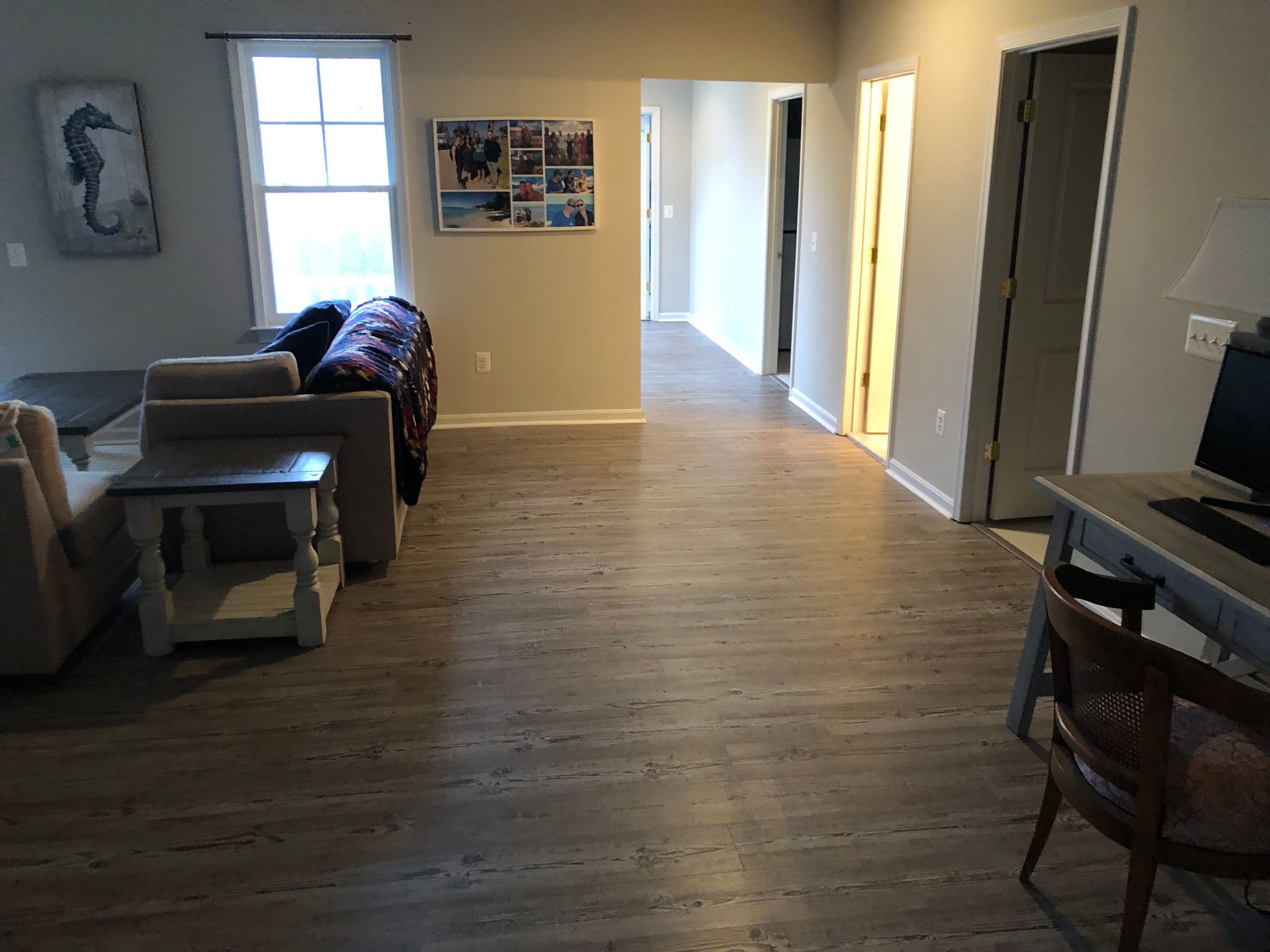 Man Installing Laminated Flooring Boards