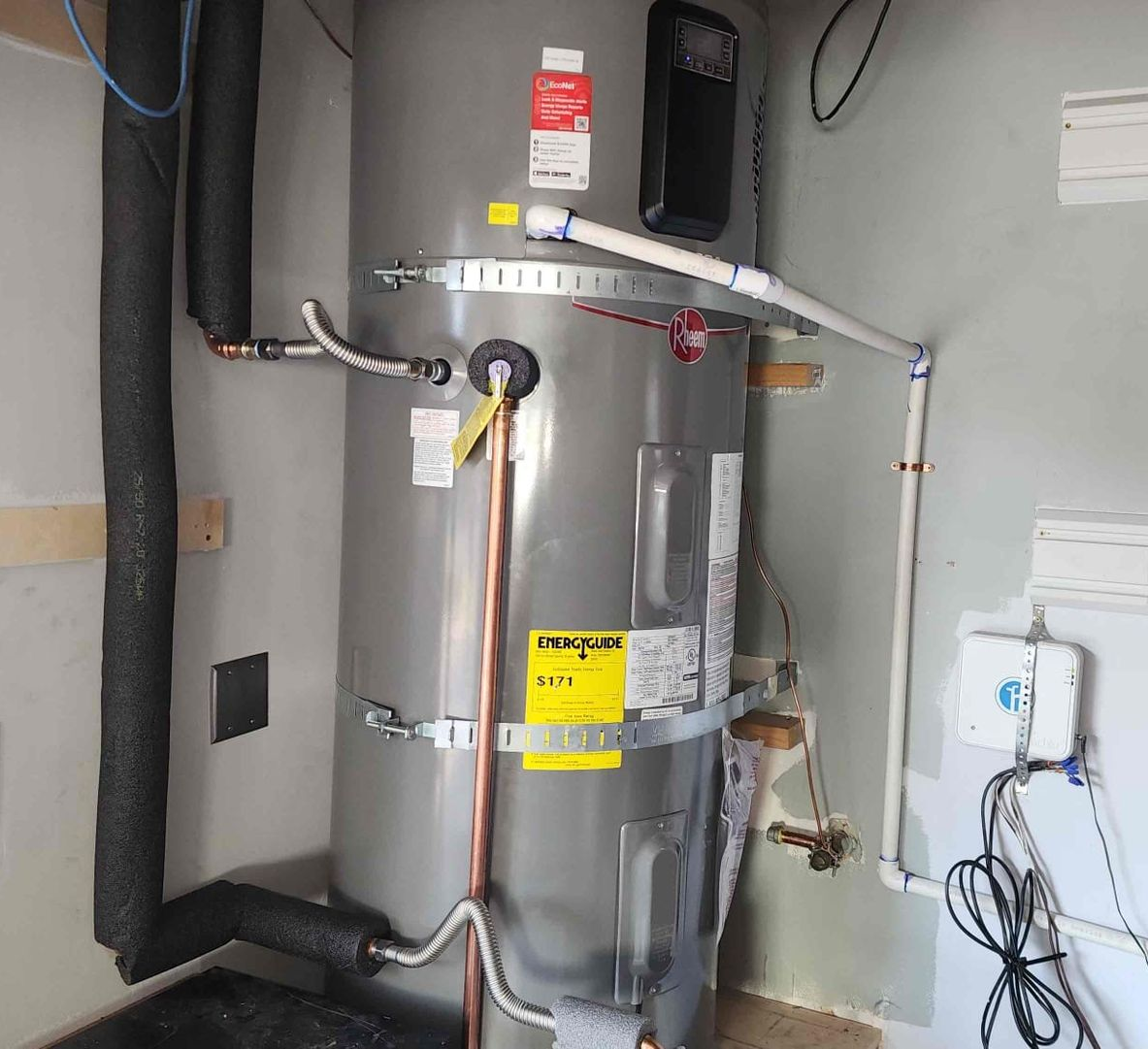 Example of a split-system heat pump water heater installation. Most residential replacements under 