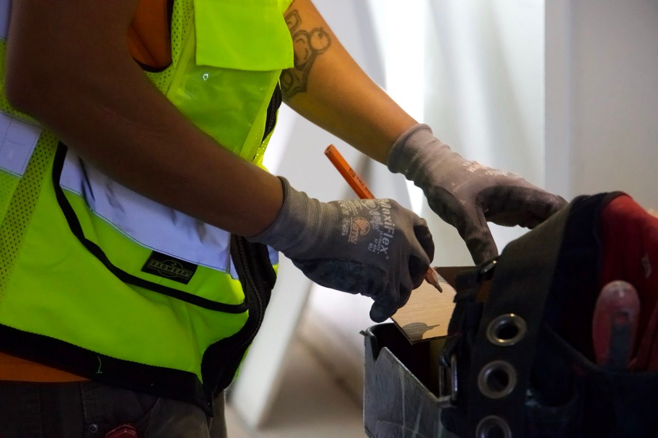 vine electric employee working on the details of a project