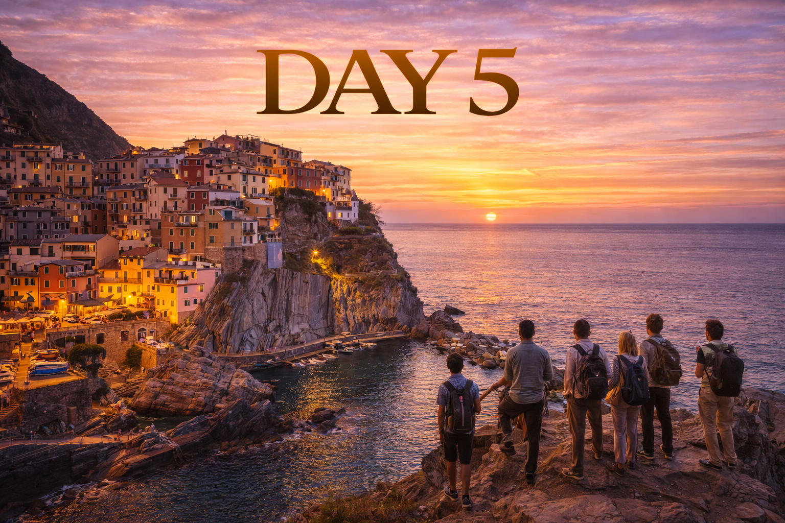 Group of hikers overlooking a coastal town at sunset. 