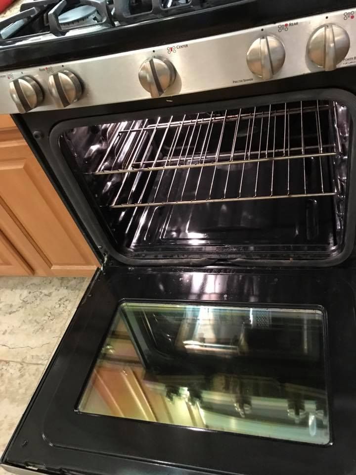 The inside of a stove with the door open
