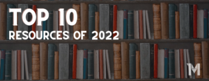 A bookshelf with the words top 10 resources of 2022 on it