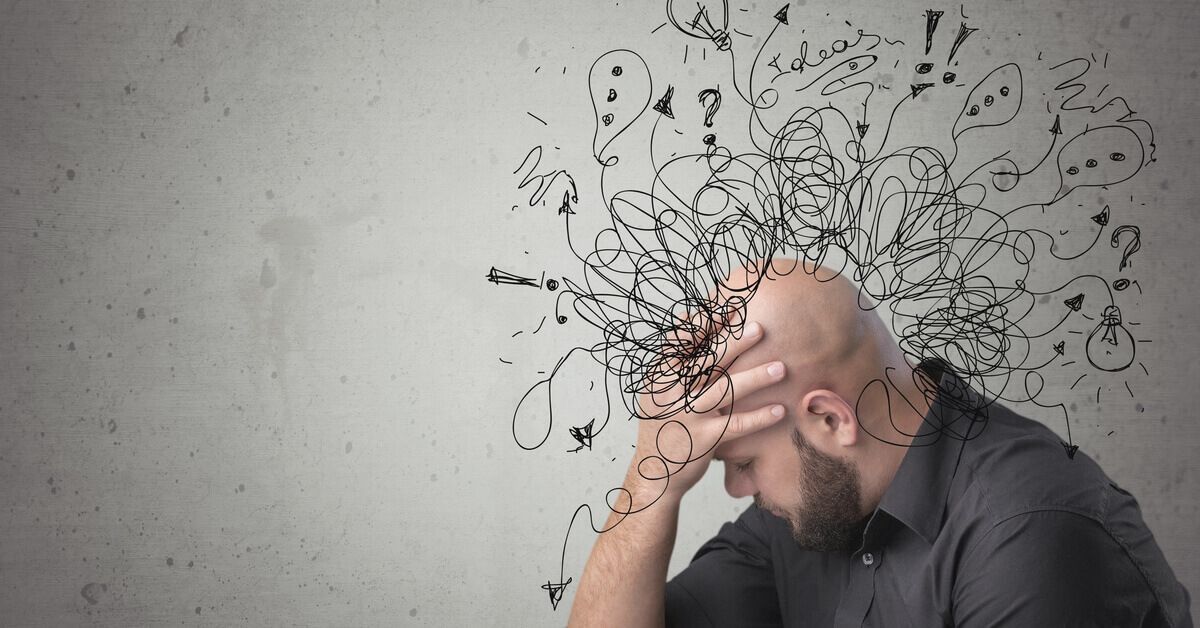 man with scrambled thoughts cloud over head - attention deficit disorder evaluation