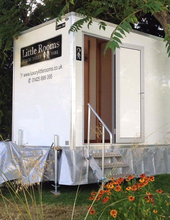 white unit of luxury toilet hire