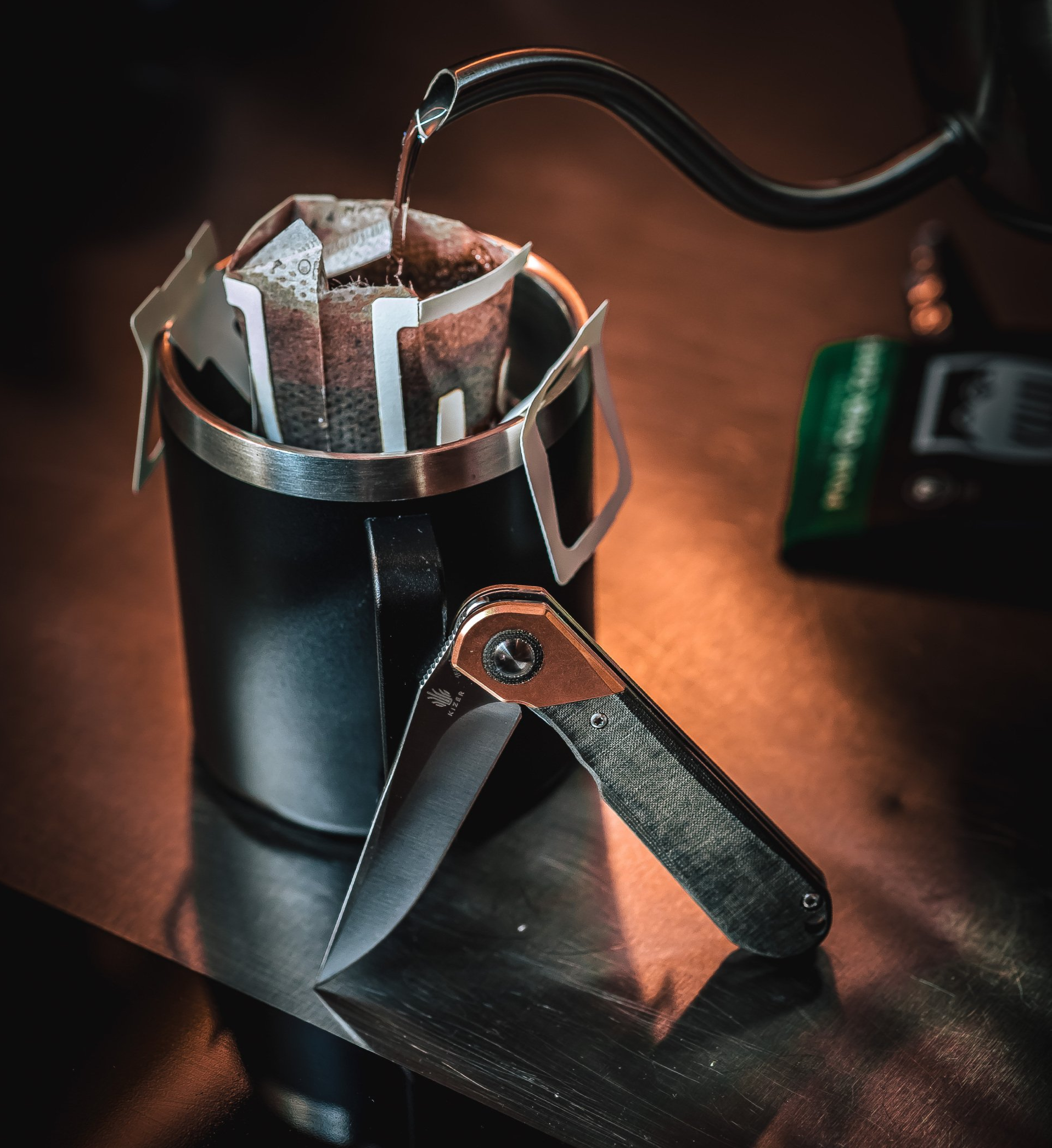 Kizer Comet next to fresh brewed coffee
