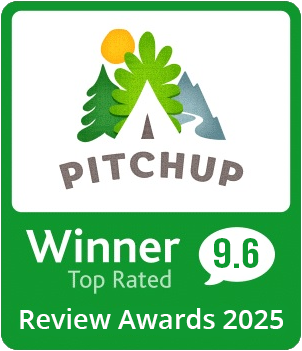 A green sign that says pitchup winner 9.7 top rated review awards 2023