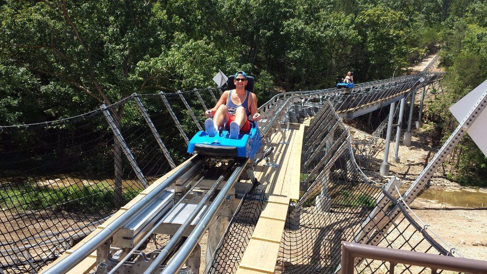 Woman enjoying riding in coaster