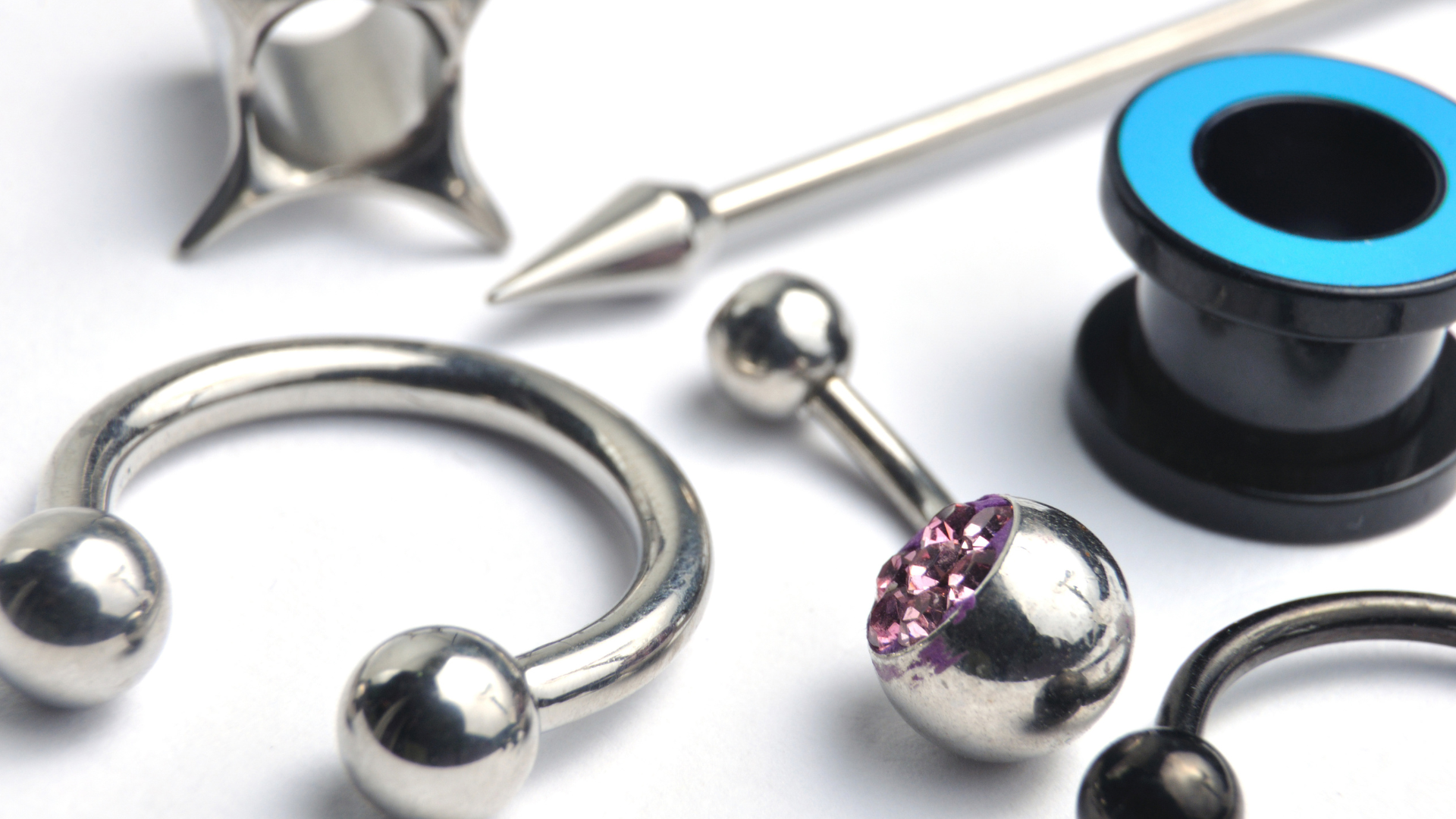 a close up of a woman 's belly with a piercing