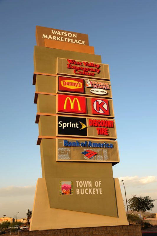 A sign that says watson marketplace on it