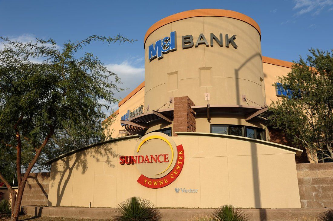 A large building with the word bank on it