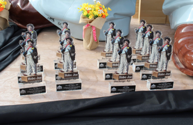 A table with a bunch of small figurines on it
