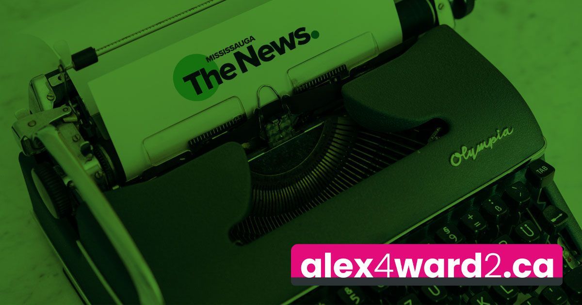 Green-tinted typewriter with paper labeled “News” in the roller