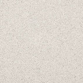 A close up of a white carpet with a grainy texture.