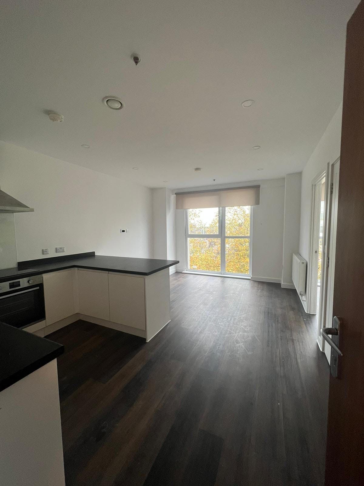 There is a large window in the middle of the room.