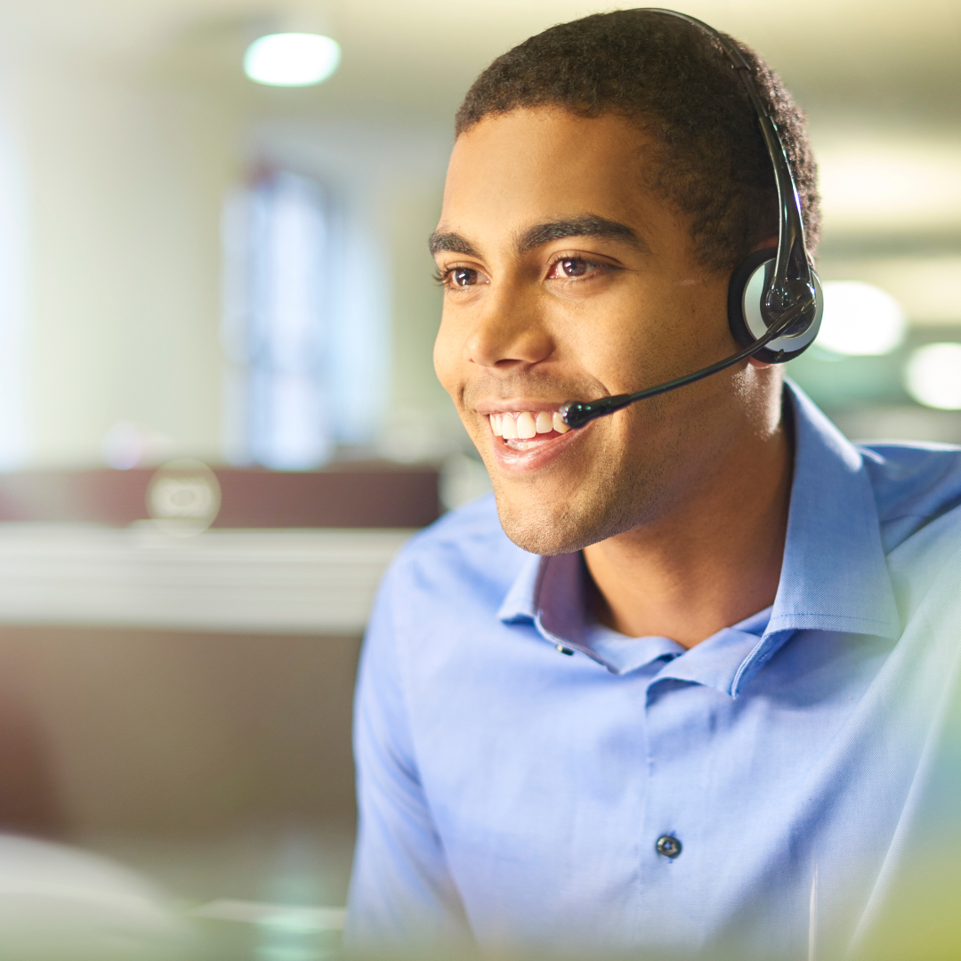man with headset answering calls