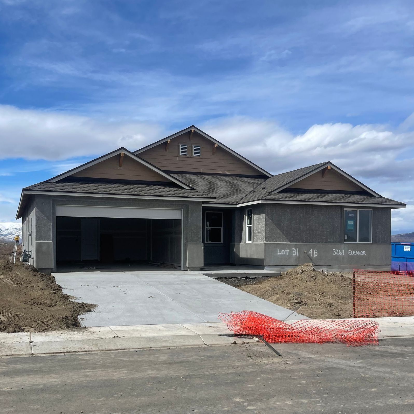 A new home being built in Reno, Nevada with new stucco texture and paint installed.