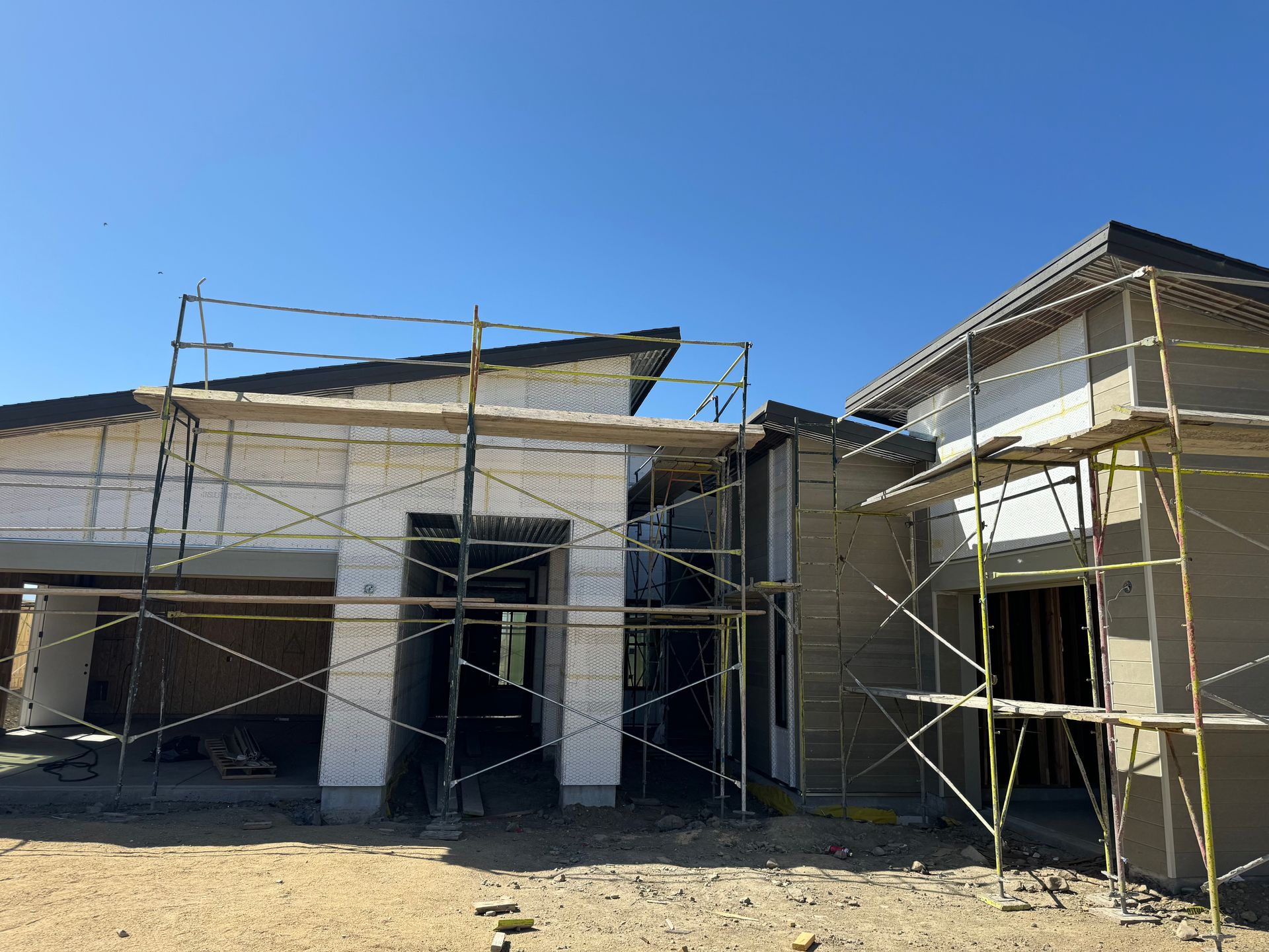 New home in Reno with new stucco being installed on the exterior.
