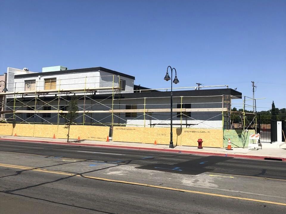A commercial building getting stucco applied in Reno, Nevada