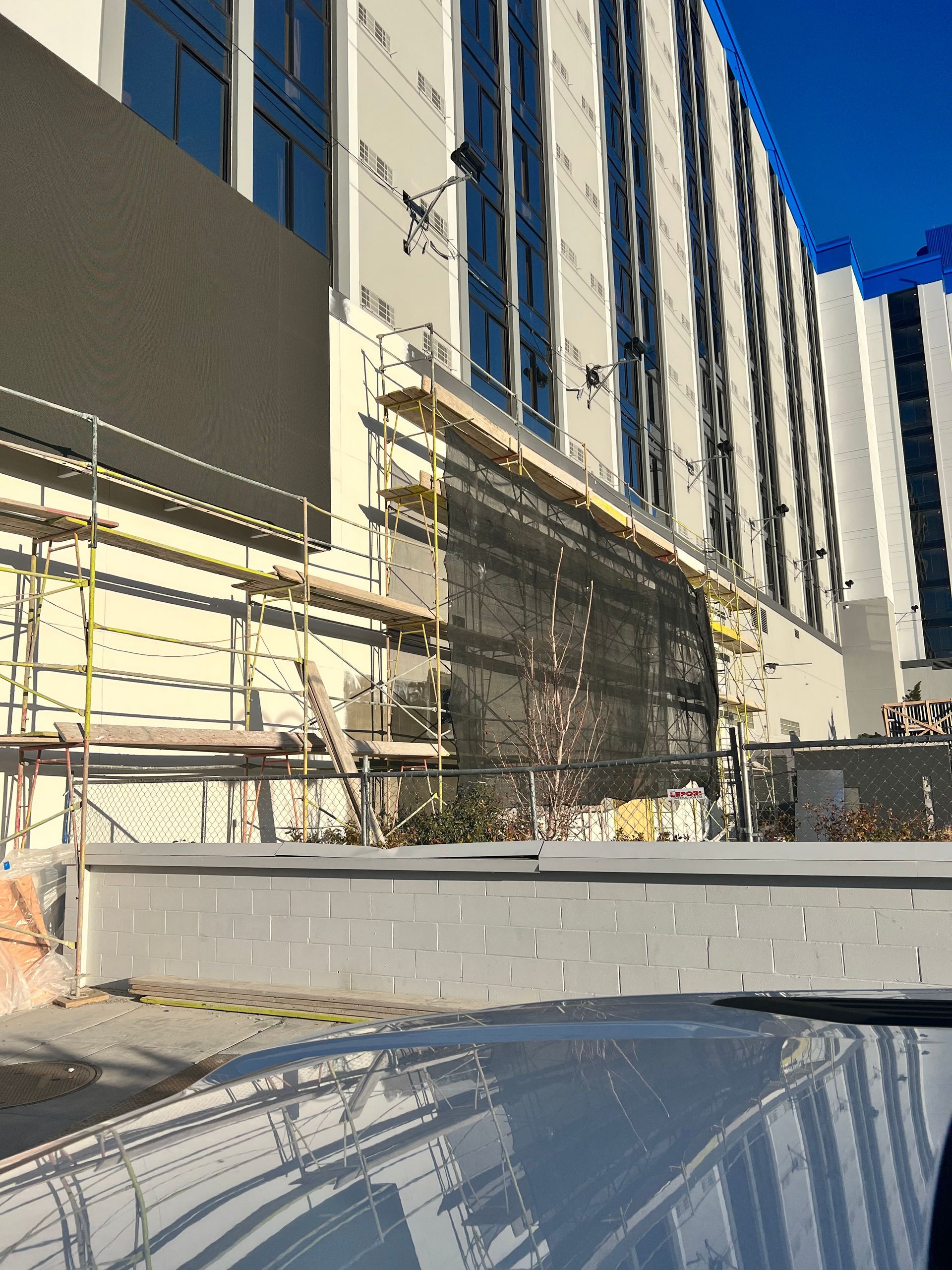 A commercial building is being prepared for stucco installation.